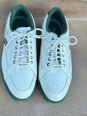 Women’s leather golf shoes with plastic spikes. White and Green—very cute